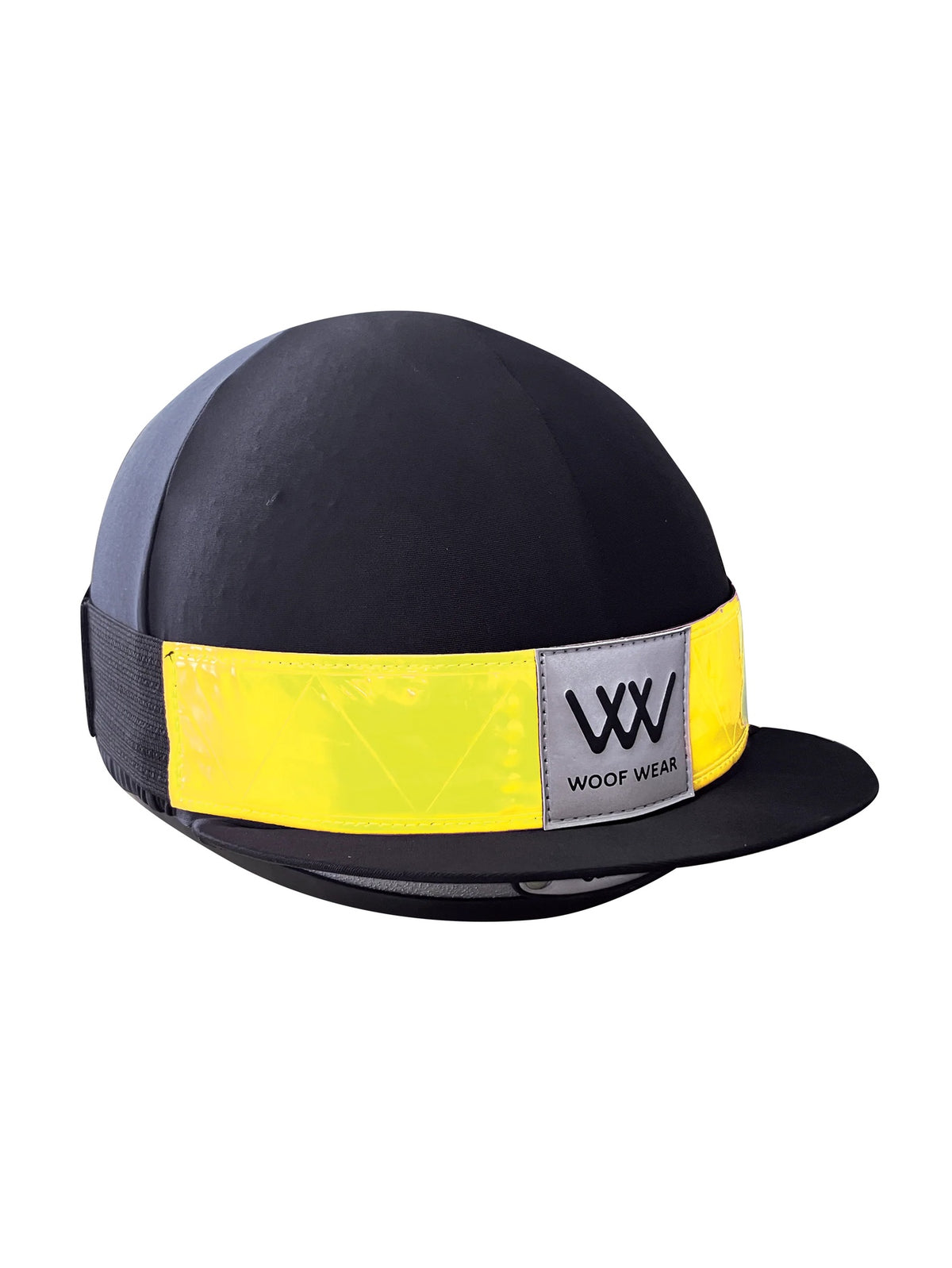 A black equestrian riding helmet with a bright yellow reflective band around the crown and a black visor, featuring a silver-grey Woof Wear brand patch on the side.