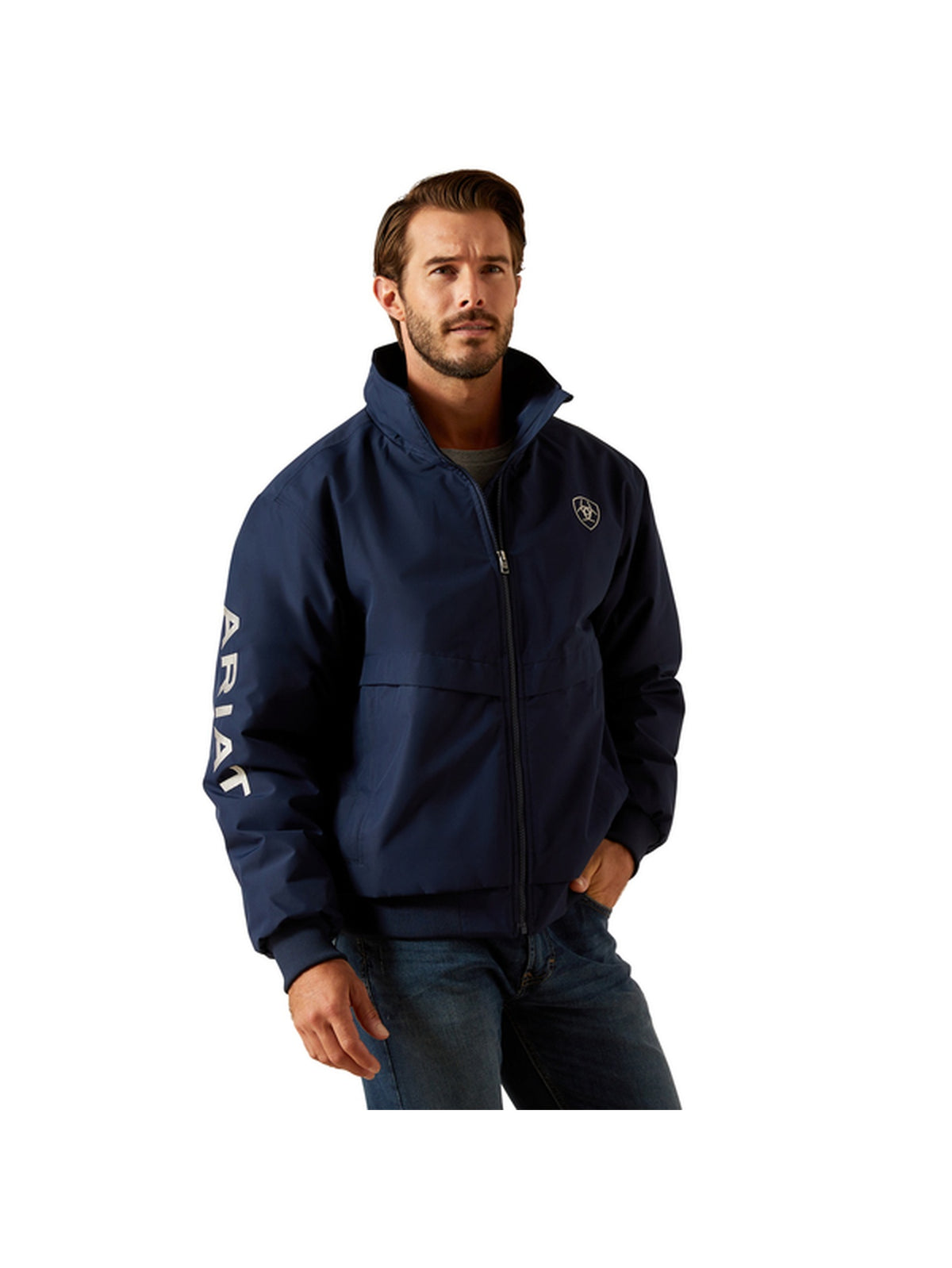 A man wearing a navy blue zip-up jacket with a high collar, featuring a white vertical 'ARIAL' logo on the right sleeve and a small shield logo on the left chest, set against a plain white background.